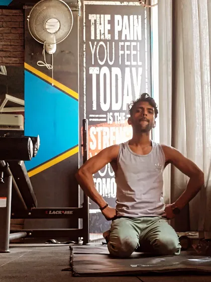 The work doesn't end until the cool down is done. This moment of rest after a tough session is just as important as the workout itself. The sign behind me says it all: "The pain you feel today is the strength you feel tomorrow."
