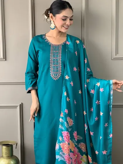 This aqua blue viscose chanderi kurta is so calming and beautiful. The printed floral dupatta adds a pop of color and freshness.