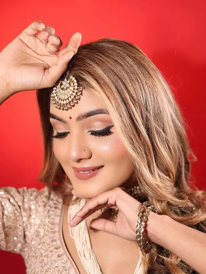 A close up on the eyes, showcasing the clean winged liner and shimmering lid. This is my signature style for creating an elegant and defined eye look.