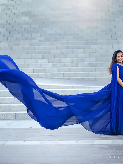 This is the moment where love and elegance meet. I aim to create breathtaking portraits that celebrate your journey to parenthood, using dramatic styling like this flowing gown to make you feel like royalty.