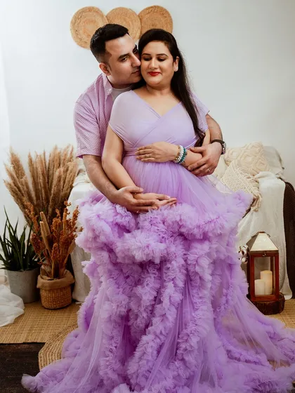 A maternity photoshoot is a wonderful way for couples to connect before the baby arrives. This tender portrait captures the love and support between the parents-to-be, creating a memory they will cherish forever.