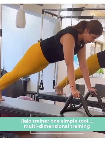 The Halo Trainer is a simple tool for multi-dimensional training, adding a new challenge to planks and other exercises on the Cadillac.