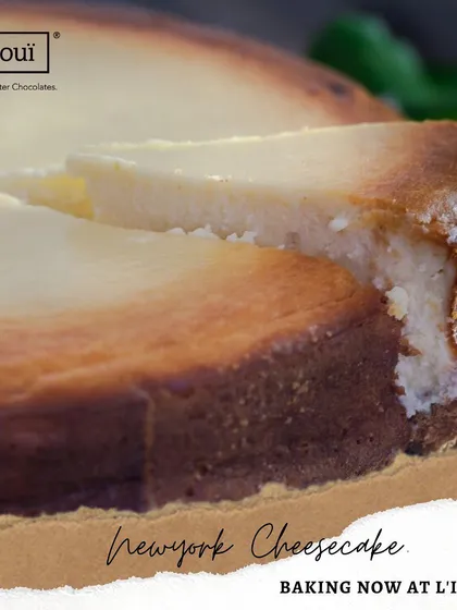 Introducing our authentic New York Cheesecake. We bake it to achieve that perfect golden-brown top and an incredibly dense, smooth, and creamy center. This is cheesecake as it is meant to be.