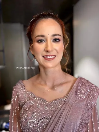 Another shot of this simple and elegant makeup look. The small bindi is a perfect traditional touch.