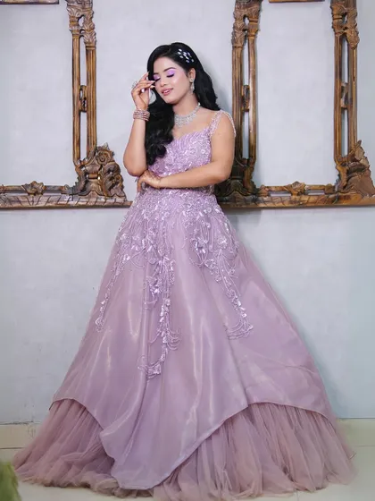 A beautiful portrait in the lilac gown, perfect for showcasing elegant and soft makeup looks.