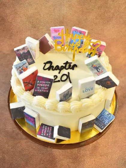 Another version of the book lover's cake, this one celebrating "Chapter 20" with a collection of favorite book titles.
