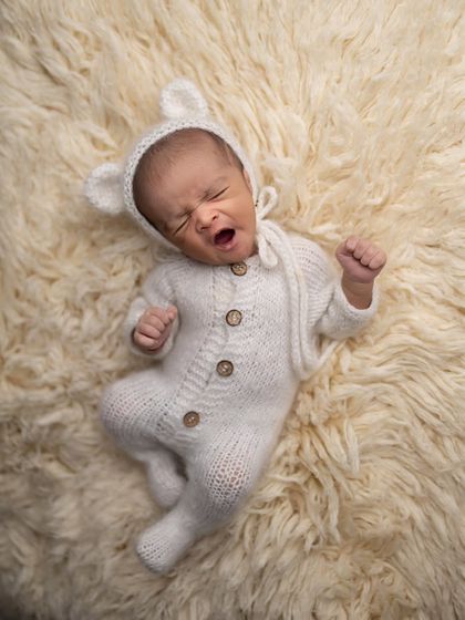 A perfectly timed shot of a big yawn from our little teddy bear. These candid moments are just as precious.
