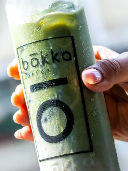 A close-up of the canned iced matcha latte, with condensation showing how cold and refreshing it is.