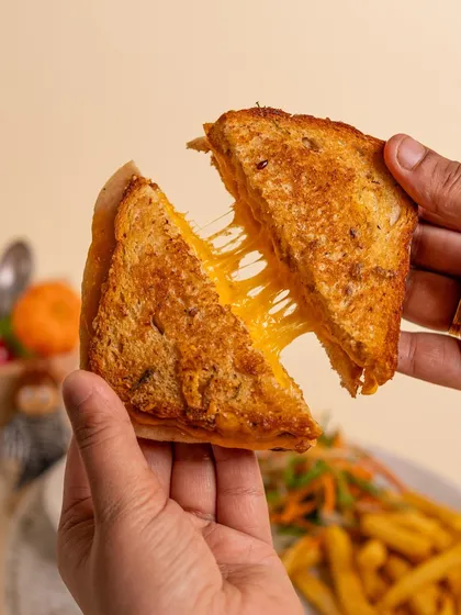 All that playing works up an appetite! Our in-house cafe serves delicious, kid-approved meals like this perfectly gooey grilled cheese sandwich that even parents will love.