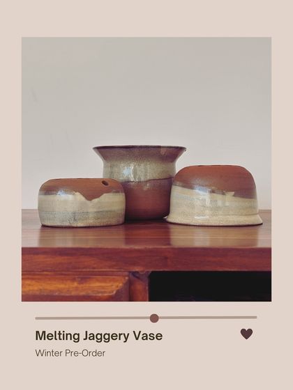 The "Melting Jaggery" vase set, inspired by the warm, golden-brown hue of traditional Indian jaggery. This three-part set can be arranged in different ways to hold flowers or stand alone as a sculpture.
