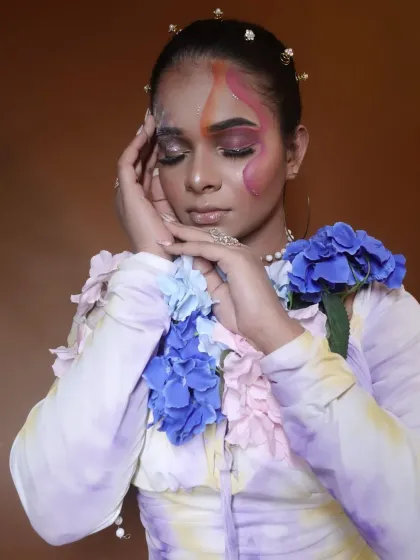 A dreamy pose from the fantasy shoot, showing the soft, watercolour-like effect on the skin.