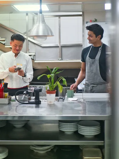 A glimpse into the engine room. Here at the pass, Chef Manu Chandra and the team are in constant motion, ensuring every plate that leaves the kitchen meets our standards. This is where instinct and precision come together.