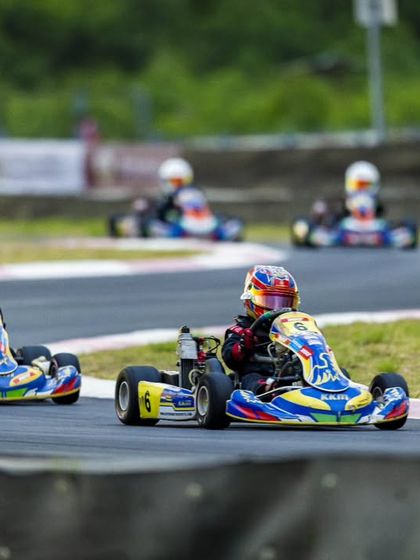 Two of our micro drivers battling it out on track. We teach our racers to compete hard but fair, pushing each other to become better and faster.