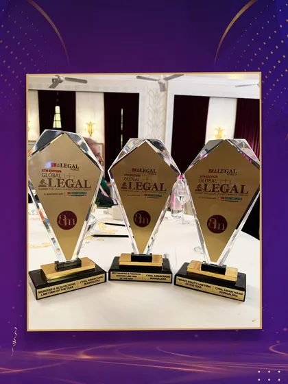 The three trophies from BW Legal World, recognizing our firm as Law Firm of the Year in M&A, Banking & Financial Services, and Private Equity.