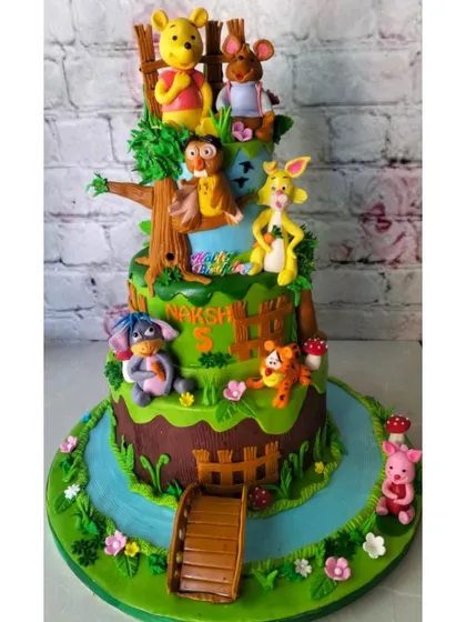 We poured so much love into crafting every detail of this Winnie the Pooh cake. From Pooh and his friends in the Hundred Acre Wood to the tiny bridge, each element is handmade to bring your favorite stories to life.