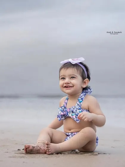 That happy, sandy smile is what beach photoshoots are all about. We capture the pure joy of your little one enjoying the sun, sand, and sea.