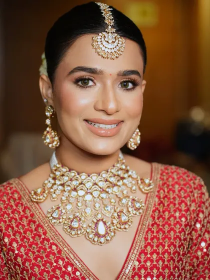 A flawless classic bridal look is a must-have skill. I'll teach you how to achieve this radiant, photo-ready finish with soft, defined eyes and a perfectly balanced nude lip that complements traditional red attire.