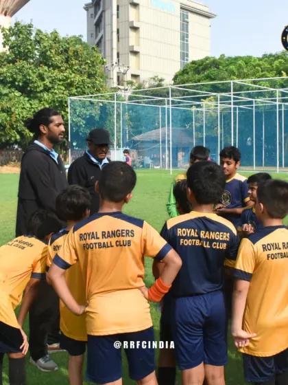A team huddle led by our coaches at our Chanakyapuri training ground. These huddles are for tactical instructions, motivation, and reinforcing the importance of playing as a team.