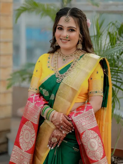 A happy, smiling portrait of the bride, her makeup looking fresh and radiant.