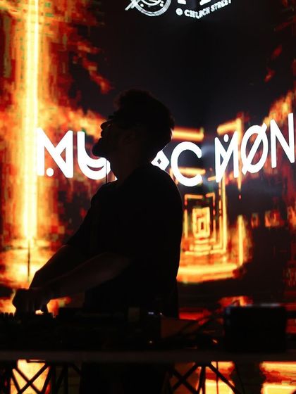 A silhouette of me against a fiery backdrop. The visuals are designed to be as powerful as the music.