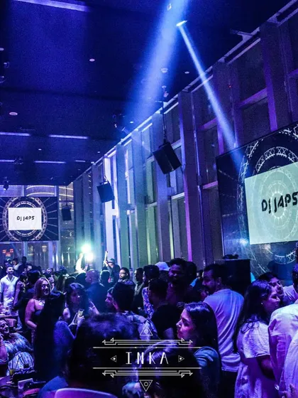 A wide view of my gig at Inka Dubai, with my name on the screens. I have experience playing for international crowds.