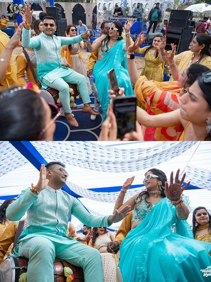 The couple makes a fun entrance, dancing on a dhol, perfectly capturing the high-energy vibe of their Haldi event.