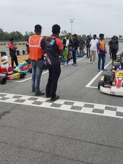 The grid before a race, with our karts and team members ready for action. The pre-race routine is a critical part of our managed arrive and drive service.