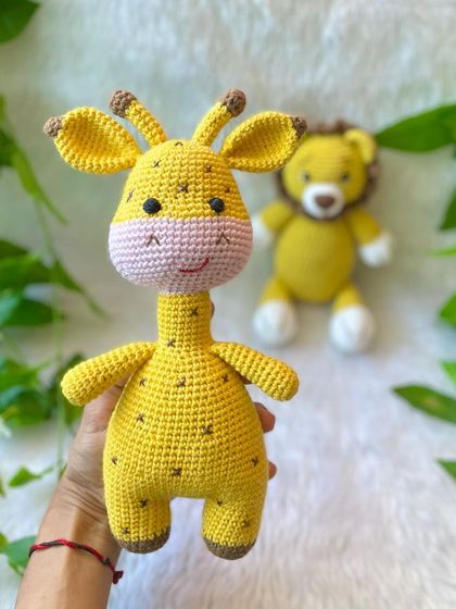 My bestseller giraffe doll is always a favorite. With its long neck, sweet smile, and spotted pattern, it's a cheerful and friendly companion for any child. This one is a larger size for extra big hugs.