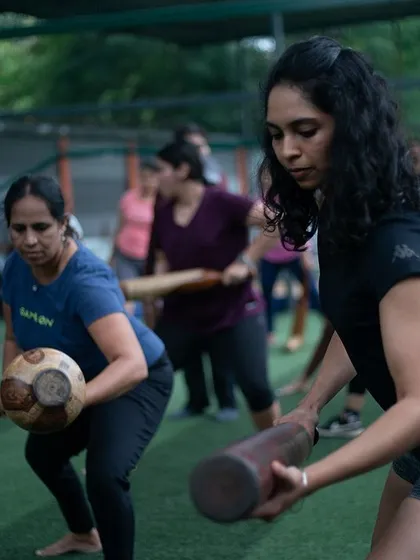 Women of all ages and fitness levels train together in a group session. This image highlights the inclusive and supportive nature of our community, where everyone is welcome to join and get stronger.