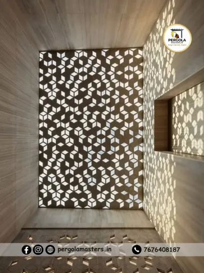 This geometric laser-cut skylight panel transforms a ceiling into a work of art. The intricate pattern filters natural light, casting captivating shadows and creating a bright, visually stunning focal point within the home's interior.