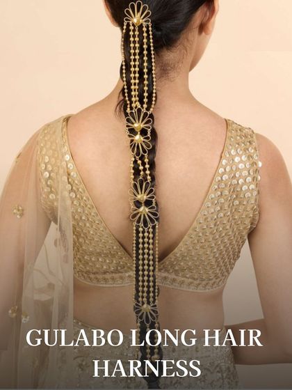 The Gulabo long hair harness is a dramatic and beautiful accessory that cascades down the length of your hair, perfect for making a statement.