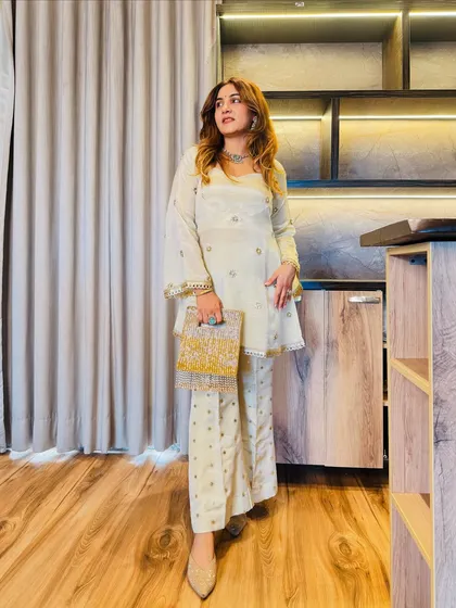The full view of my Rakhi outfit. The A-line kurta and wide-leg pants create a flattering silhouette, while the coordinated set makes for an effortlessly chic festive look.