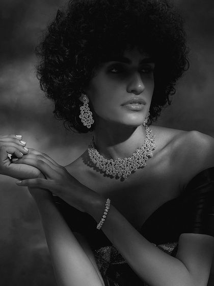 A black and white version of a shot for Purab Paschim, emphasizing the form and brilliance of the diamond jewelry through high-contrast lighting.