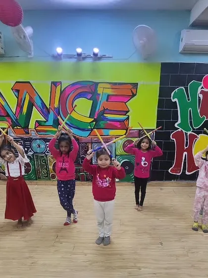 Even our youngest batch gets to learn fun choreography using props like dandiya sticks. It helps them with rhythm and coordination while they have a great time.