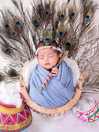 A closer look at our newborn Krishna. The tiny flute, the hand-painted matki, and the gentle wrap all come together to celebrate the divine in its smallest form.