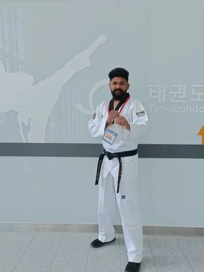 Posing at the Taekwondowon, the heart of global Taekwondo.