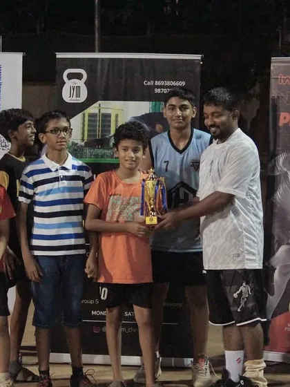 The U-11 runners-up, Team Alpha, receiving their trophy at Hooplah '24.