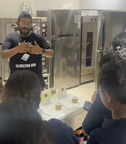 Our trainer leading a session for the team at Just Appetite, explaining the journey from bean to cup.