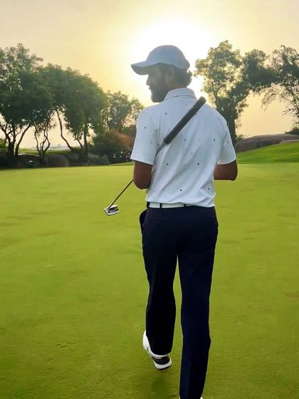 With putter in hand, walking towards the green after an approach shot. This is where the scoring happens, and my coaching places a heavy emphasis on a sharp and reliable short game.