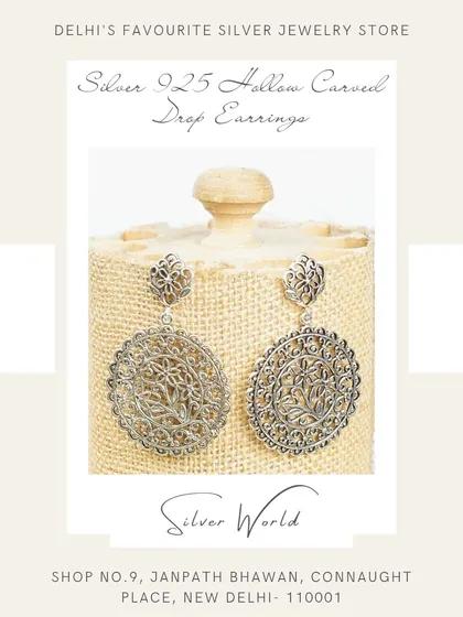 Our bestselling lightweight hollow carved drop earrings. The intricate 'jaali' or net-like work makes them incredibly light despite their large size, offering a bold look without the weight.