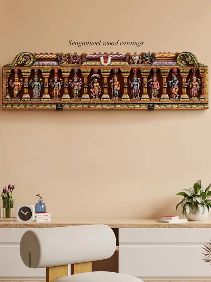 This is how our exquisite wooden Dasavatharam panel can transform a space. The multicolored, 10-avatar relief carving serves as a stunning focal point above a desk or console, bringing a story of divine heritage into modern interiors.