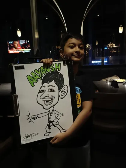 This young karate kid's caricature shows off his skills. I love incorporating hobbies into the drawings.