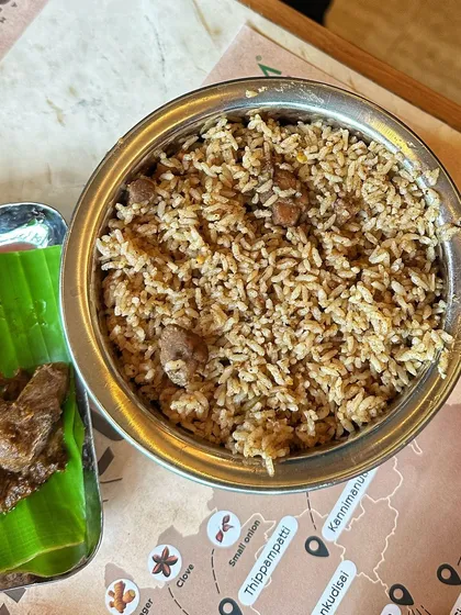 A simple, rustic serving of my Mutton Palav. You can see the texture of the rice and the tender pieces of meat, a testament to my traditional cooking style.