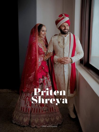 A classic, elegant portrait of the bride and groom in their stunning North Indian wedding attire.