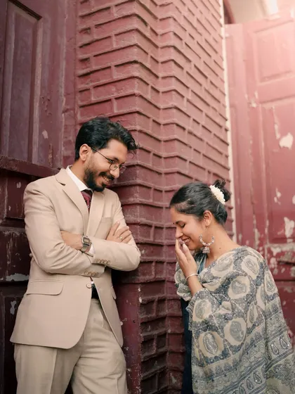 It's the unposed, in-between moments that I love to capture the most. Aditya’s smile and Rattan’s shy laugh here are completely genuine. This is the essence of my vintage-style shoots, focusing on real emotions against the classic backdrop of old Mumbai.