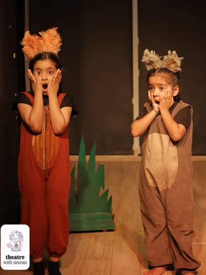 The two wolves from our reimagined "Three Little Pigs" story, looking shocked at what they've discovered.