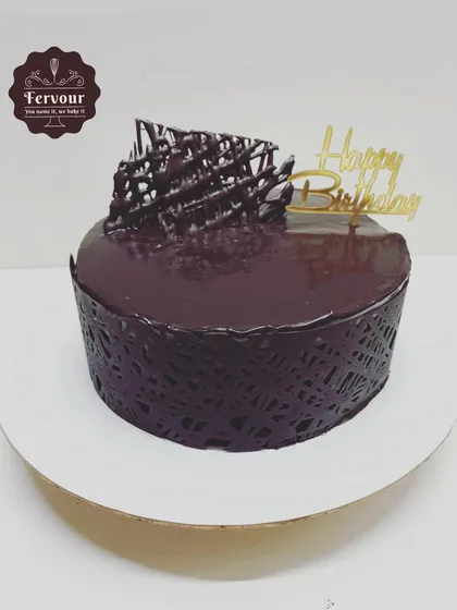 A simple yet elegant chocolate cake. This cake is perfect for any celebration, made with high-quality ingredients and no preservatives or premixes.