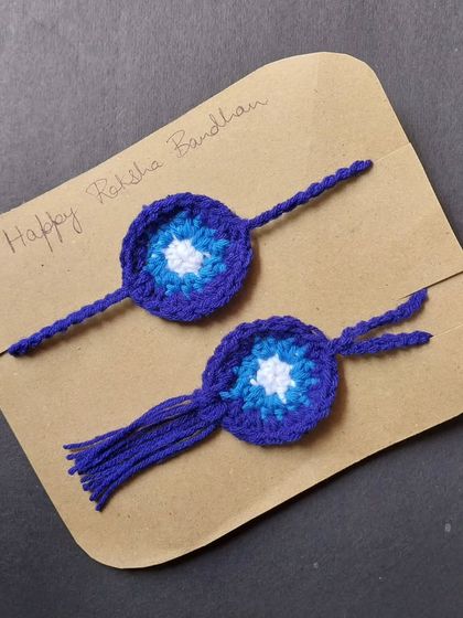 A special evil eye rakhi set for 'bhai-bhabhi'. The same popular design can be adapted for different occasions and relationships.