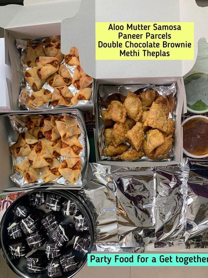 Party food for a get together. This order included my popular Aloo Mutter Samosas, Paneer Parcels, Double Chocolate Brownies, and Methi Theplas, a perfect mix of savory and sweet.