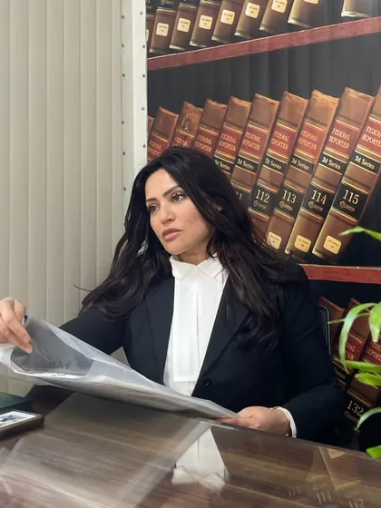Reviewing a case file in my office. The ability to meticulously draft and file legal documents is a fundamental skill for any successful advocate.